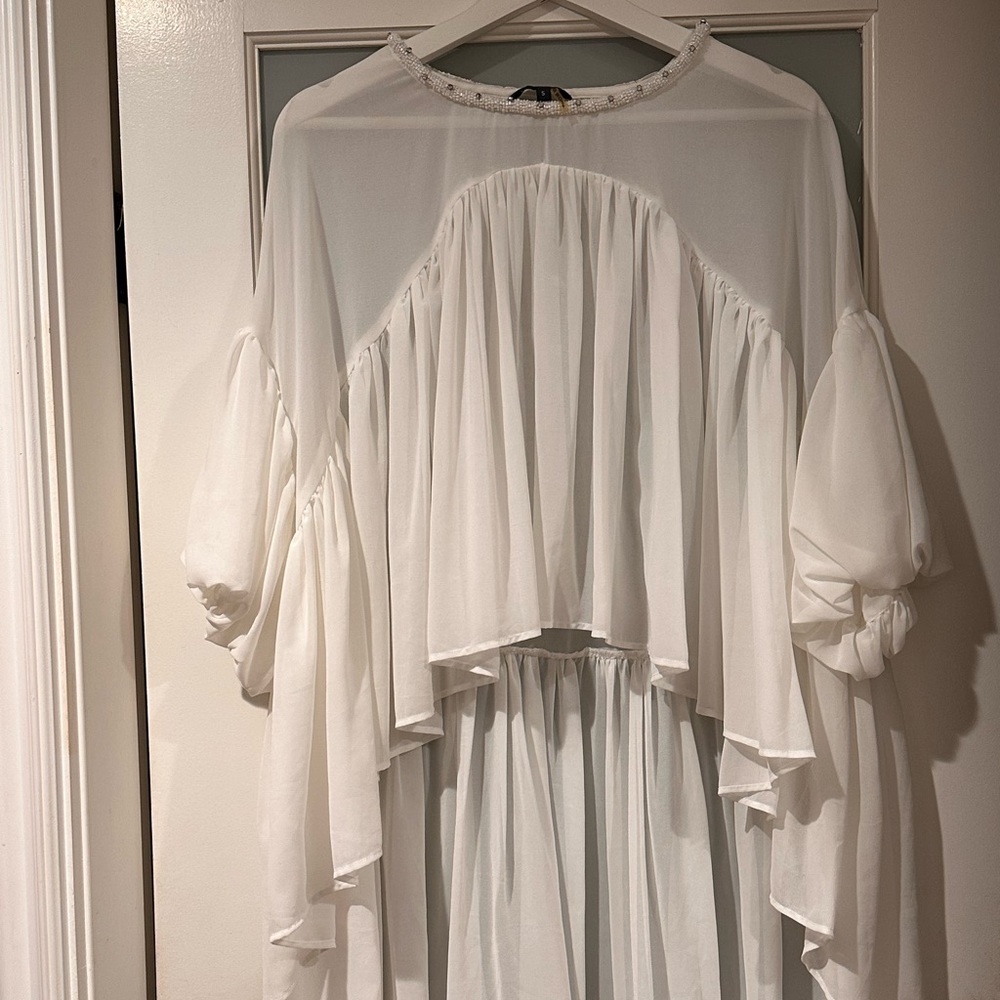 High Low off white blouse with beaded neck